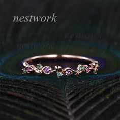 This ring is handmade The metal is 14k rose gold (If you would like 18Kgold, pls contact me) The stones are natural emerald & amethyst Setting diamond in this design: https://www.etsy.com/listing/524994131/stacking-art-deco-wedding-bandhalf?ref=shop_home_active_20&crt=1 I can make any jewelry.Contact me if you have something in mind,I'll make it come true! The jewelry can be rings,bands,pendants,necklace,bracelet,bangles,earrings... Gemstone or diamonds can be SI,VS,VVS clarity. Gold can Dainty Rose Gold Amethyst Promise Ring, Dainty Rose Gold Amethyst Wedding Ring, Dainty Rose Gold Emerald Ring For Anniversary, Rose Gold Multi-stone Amethyst Wedding Ring, Rose Gold Multi-stone Amethyst Ring For Wedding, Rose Gold Stackable Wedding Rings With Birthstone, Wedding Multi-stone Amethyst Ring In Rose Gold, Rose Gold Stackable Birthstone Rings For Wedding, Emerald Wedding Band