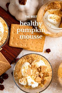 the best healthy pumpkin mousse is served in small dishes with graham crackers