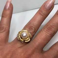 Beautiful Floral Inspired Pearl Ring * Genuine 7.5mm Round Freshwater Pearl * Sized to Order - Select Your Size * Available in Sterling Silver, 10k or 14k Yellow, White or Rose Gold - Select Your Metal Hallmarked & Gift Ready! TIMELESS, BEAUTIFUL & UNIQUE FINE ART JEWELRY This Ring is Made & Custom Sized to Order. A 5-10 business day handling time is required for sizing, setting and polishing. Actual delivery transit time will depend on the shipping method you choose. Because of the Gold Pearl Ring Stamped 14k For Gift, Elegant Floral Ring Stamped 14k, Gold Round Flower Ring Fine Jewelry, Gold Flower Ring Fine Jewelry, White 14k Gold Flower Ring, Round 14k Stamped Gold Flower Ring For Anniversary, 14k Stamped Pearl Ring As Gift, Elegant Gold Flower Ring With Diamond Cut, Stamped 14k Flower Ring For Anniversary