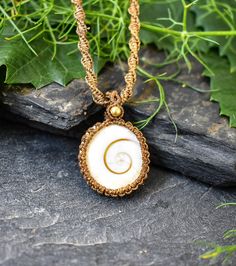 This Elegant Shiva Eye Shell Micro Macrame Necklace is Handmade with Micro Wax Thread. I bring this Shell from Gokarna Beach in India and this simple and at the same time elegant design reminds me so much my last trip around Karnataka State in India. These kind of designs inspired in nature can help us so much to connect with the elements and Nature Itself, reinforcing our feeling of belonging to the Pachamama. Shiva's eye is known to protect wearers from all forms of negativity help to concentr White Shell Necklace With Adjustable Cord As Gift, Handmade White Spiral Necklaces, Handmade Cream Shell Necklace For Gift, Handmade Cream Shell Necklace Gift, Handmade Cream Shell Jewelry, Handmade Adjustable Shell Pendant, Shiva Eye, Rustic Necklace, Seashell Necklace