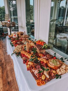 a long table covered in lots of different types of food