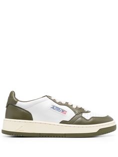 Medalist leather low-top sneakers from Autry featuring olive green, white, calf leather, two-tone design, perforated toebox, logo patch to the side, debossed logo to the rear, logo patch at the tongue, branded insole, round toe, front lace-up fastening and flat rubber sole. Size Info IT Color Detail Green Made In Indonesia Material Outer: Calf Leather 100% Sole: Rubber 100% Lining: Fabric 100%, Calf Leather 100% Season One Fall-Winter Season Two Fall-Winter Product sneakers Brand Autry Size And Leather Lace-up Sneakers With Logo Patch, Classic Green Sneakers With Contrast Sole, Leather Low-top Sneakers With Logo Patch, Green Leather Sneakers With Embossed Logo, Classic Green Low-top Sneakers, Sporty Leather Sneakers With Logo Patch, Sporty Olive Leather Sneakers, Classic Low-top Sneakers With Logo Patch, Green Leather High-top Sneakers With Perforated Toe Box