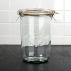 a glass jar sitting on top of a counter