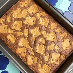 a square cake in a pan on top of a table