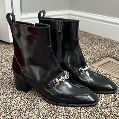 Bought Last Year And Never Wore Perfect Boot For A Trip To Europe Or Vegas Has Small Marks From Closet As Shown But Have Since Been Stored In Box Do Not Have Original Box/Dustbag Euro Size Is 38.5 Elegant Formal Boots With Chain Detail, Elegant Formal Boots With Chain, Elegant Formal Boots With Chain Strap, Formal Boots With Chain And Round Toe, Black Boots With Chain Strap For Formal Occasions, Formal Black Boots With Chain Detail, Formal Black Boots With Chain, Black Patent Boots, Trip To Europe