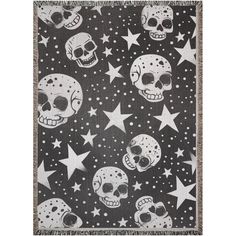 a blanket with skulls and stars on it