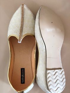 The white and gold Men's slip on Shoes, white Mens Flats, Mens Slippers, Flats,Handmade Slippers,Men's Shoes,Mens Casual Shoes, Indian shoes, Rajasthani shoes, wedding juttis, shoes for groom If you don't find your size you may want to check other pattern in white gold colour. https://www.etsy.com/in-en/listing/672754564/white-and-gold-mens-shoes-khussa-mens SIZING INSTRUCTIONS- Need assistance, please convo me 1. These shoes run true to the standard US size and are available in medium width onl Gold Slip-on Shoes For Formal Wedding, Gold Slip-on Wedding Shoes, Gold Slip-on Wedding Shoes For Formal Wear, White Closed Toe Wedding Shoes, Festive White Closed Toe Wedding Shoes, White Flat Wedding Shoes For Festive Season, White Wedding Shoes With Round Toe, White Closed-toe Wedding Shoes, Festive White Wedding Shoes With Round Toe