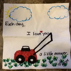 two hand towels with embroidered pictures of tractors and clouds on them, one says each day i love you