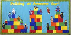 a bulletin board with legos on it that says building an awesome year