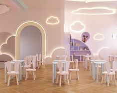 the interior of a children's playroom with pastel furniture and clouds painted on the walls