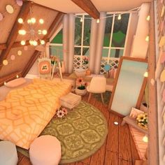 a bedroom with a bed, chair and window in it's attic area that has lights hanging from the ceiling