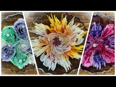 three different types of flowers on a glass plate