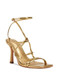 These chic gold heels feature delicate strappy detailing and lace up straps for a trendy touch. The open toe design and square toe add modern flair. Step into style and comfort with these must-have heels. 4" Heel height Cute Gold Short Heels, Luxury Gold Heels, Shoes For Gold Dress, Wedding Guest Shoes Heels, Gold Heels Aesthetic, Gold Prom Heels, Grad Heels, Gold Heels Wedding, Gold Heels Prom