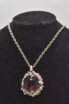 This is in lovely condition Drop of Necklace is 35cm Marked Miracle Victorian Round Necklaces For Evening, Formal Costume Jewelry Necklace With Large Pendant, Formal Round Pendant Costume Necklace, Victorian Style Round Evening Necklace, Victorian Hallmarked Purple Necklace, Antique Purple Hallmarked Necklace, Vintage Purple Pendant Necklace, Red Vintage Cabochon Necklace, Vintage Amethyst Pendant Necklace