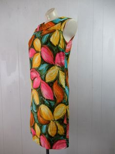 "Vintage 1960s multi color cotton dress. Has painterly floral design, scoop neck with collar, orange Acrylic lining and back zipper. Made by Charlotta of California. About a size medium. Actual measurements are: 37\" around the bust 35\" around the waist 35.5\" around the hips 14.5\" shoulder to shoulder 31\" overall length In very good condition." 1970s Cotton Dress With Retro Print, Mod Multicolor Floral Print Dress, Mid-century Fitted Dress With Vintage Print, Multicolor Mod Floral Print Dress, Mid-century Floral Print Spring Dress, Painterly Floral, Beauty Forever, Vintage Dresses 1960s, 1960s Dress