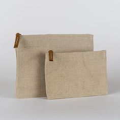 Jute is an amazing natural and sustainable material, so we made a set of zippered pouches in a size that works well for so many things. With a striped cotton lining and leather pull, it's perfectly elegant on its own or as an organizer in your bag or backpack. Set of two. Mens Lightweight Jacket, Backpack Set, Dressy Sandals, Denim Jacket Men, Online Shopping For Women, Zip Pouch, Leather Pulls, Mens Slippers, Mitten Gloves