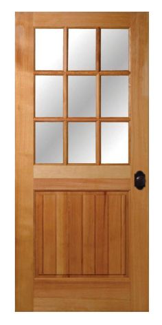 a wooden door with glass panels and mirror