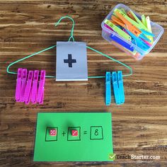 a wooden table topped with lots of crafting supplies