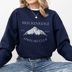 This Breckenridge Après-ski Club sweatshirt is the perfect way to elevate your ski wardrobe and pay tribute to the alpine elegance of Breckenridge, Colorado. Crafted for comfort and style, this Breckenridge Crewneck is perfect for après-ski gatherings or casual outings in the charming town. Immerse yourself in the spirit of the wonderful ski season, whether you're hitting the slopes or cozying up by the fire. Ideal for any situation, a unisex heavy blend crewneck sweatshirt is pure comfort. These garments are made from polyester and cotton. This combination helps designs come out looking fresh and beautiful. The collar is ribbed knit, so it retains its shape even after washing. There are no itchy side seams on these sweaters.  - 50% cotton, 50% polyester - Medium-heavy fabric (8.0 oz/yd² ( Crew Neck Sweatshirt For Winter Sports, Crew Neck Tops For Ski Season, Long Sleeve Ski Tops For Ski Season, Long Sleeve Skiing Tops For Ski Season, Funny Rock, Ski Club, Breckenridge Colorado, Ski Season, Club Sweatshirts