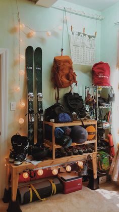 a room filled with lots of ski equipment