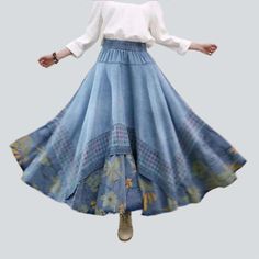 Make a bold statement this summer with our 2023 Spring-Summer Collection Bohemian Flower print denim skirt! Featuring a boho-style. this long. high-waisted skirt with embroidered details and rubber closure is the perfect blend of contemporary fashion and nostalgic grunge.Why You'll Love It: Embroidered Details: Delicate floral embroidery on the edges of this skirt brings a touch of boho-inspired style. Long & High-Waisted: The length and high-waisted cut of this skirt accentuate any figure. maki Denim Blue Patchwork Skirt For Summer, Summer Denim Blue Patchwork Skirt, Non-stretch High Waist Denim Skirt For Spring, Spring Denim Patchwork Skirt, Summer Patchwork Denim Skirt In Denim Blue, Summer Patchwork Denim Blue Denim Skirt, Summer Patchwork Denim Skirt, Bohemian High Waist Floral Print Skirt, Bohemian Spring Bottoms With Floral Patchwork