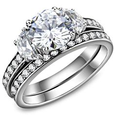 Description This beautiful ring is all you need to look attractive! Its amazing AAA grade cubic zirconia sets an eye-catching display of luxury. It is also equipped with a highly polished surface! Product Features: 2pc stainless steel wedding ring set with AAA grade cubic zirconia Stone color: clear Stone shape: round Center stone setting: three stone Stone setting: channel Band style: traditional Stainless steel band with a high polished finish - no plating Made from highly corrosive resistant TK316 stainless steel Center stone size: 8 (mm) Ring size: women's 8 Weight (approx): 4.80 (g) Material(s): stainless steel/cubic zirconia Product Specifications Weight Width Height Depth 0.01 LBS 3.00" 3.00" 3.00" Warning: CHOKING HAZARD-Small Parts Adult Supervision Required. Stainless Steel Wedding Ring, Diamond Bridal Ring Sets, Promise Ring Set, Titanium Jewelry, Engagement Sets, Diamond Bridal Sets, Bridal Ring Sets, Stainless Steel Ring, Engagement Bands