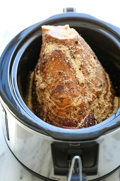 a crock pot with some bread in it