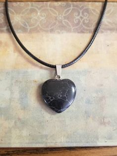 "New Black Turquoise Heart Pendant Necklace Turquoise radiates peace, calmness and tranquility. It recharges our spirits during periods of mental stress and fatigue, and removes the feeling of loneliness. ♡ Heart pendant measures 3/4\" wide by 3/4\" long ♡ 18 inch black leather cord with 2 inch extender ♡ Lobster clasp closure ♡ Silver clasps ♡ Ships within 24 hours of purchase Monday-Saturday" Black Adjustable Heart Charm Necklace, Adjustable Black Heart Charm Necklace, Adjustable Black Heart Pendant Necklace, Black Necklace With Adjustable Heart Charm, Adjustable Black Necklace With Heart Charm, Black Adjustable Heart Pendant Necklace, Adjustable Black Heart Necklace As Gift, Heart-shaped Adjustable Necklace With Natural Stones, Heart-shaped Necklace With Natural Stones