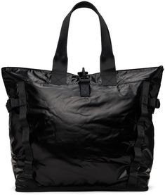 Waterproof TPU-coated ripstop tote in black. · Twin shoulder straps · Carabiner fastening at top · Logo-woven daisy chains at face and back face · Cinch strap at sides · Zip closure · Mesh patch pocket and lanyard clasp at interior · Taffeta lining · Logo-engraved black hardware · H16.75 x W20.5 x D8 / 43 L Supplier color: Black Black Waterproof Nylon Bag, Urban Waterproof Black Bag, Black Bags With Adjustable Straps For Outdoor Activities, Black Nylon Bags With Adjustable Straps, Rains Bag, Weekend Duffle Bag, Daisy Chains, Rolltop Backpack, Sibu