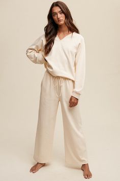 Cozy up in style with our women's v-neck loungewear set. soft, stretchy fabric, practical pockets, and a drawstring waist for ultimate comfort. Weather Models, Matching Pants, Comfy Fashion, Loungewear Set, China Fashion, Drawstring Pants, Sheer Fabrics, Print Pattern, V Neck Tops