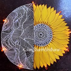 an intricately designed sunflower with lights around it