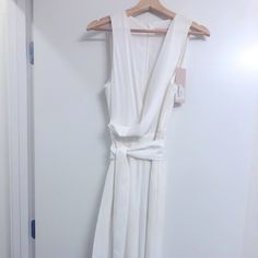 Never Worn, Chiffon Sleeveless Jumpsuit With High Slits In Both Legs. Tie Belt At The Waist. Zip Closure In Back.Not See Through. Perfect For Bridal Events Sleeveless Summer Jumpsuits And Rompers For Wedding, Chic Sleeveless Jumpsuits And Rompers For Wedding, Chic Sleeveless Jumpsuit For Wedding, Sleeveless Jumpsuits And Rompers With Tie Waist For Party, Chic Sleeveless Jumpsuits And Rompers With Tie Waist, Sleeveless Tie-waist Jumpsuits For Date Night, Sleeveless Tie Waist Jumpsuit For Date Night, Elegant Sleeveless Tie Waist Jumpsuits And Rompers, Sleeveless Chiffon Jumpsuit For Spring