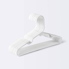 a white plastic hanger on a white background