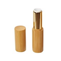 Description These natural ABS lip balm tubes with natural caps are the durable. The turning wheel mechanism on the lip balm tube allows for your hand-made lip balm or gloss to be cleanly and evenly dispensed. Our natural lip balm tubes is suitable for you to tranvel or work. Features - Color: Golden. - Material: ABS and bamboo. - Size: Approx. 7.5x1.2x1.2cm. - Bamboo design is fashion and classical. - Easy to use: lip balm containers have push wheel mechanism to effortlessly push your lip balm t Bamboo Containers, Diy Bamboo, Lipstick Container, Lip Liner Set, Peach Lipstick, Lip Balm Containers, Plastic Spray Bottle, Cosmetic Bag Organization, Travel Size Toiletries