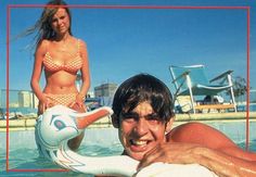 a man and woman are posing in the water with an inflatable object behind them