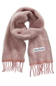 Twisted fringe trims the ends of this soft Italian scarf made from alpaca blended with wool and mohair in a solid hue. 88" x 11 1/2" 33% alpaca, 25% wool, 22% nylon, 20% mohair Dry clean Made in Italy Wool Scarf Aesthetic, Aesthetic Scarf, Cute Scarfs, Pink Scarf, Winter Mode, Pink Scarves, Fringe Scarf, Stockholm Fashion