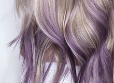 25 Styles That Make Purple Highlights Look Totally Wearable Dark Blonde Lavender Hair, Ash Blonde With Purple Peekaboo, Peekaboo Hair Color Purple Blonde, Purple Root Smudge Blonde, Purple And Blonde Balayage, Grey Hair With Purple Peekaboo, Purple Grey Balayage, Purple Highlights Blonde Hair Straight, Short Blonde Hair With Purple Tips