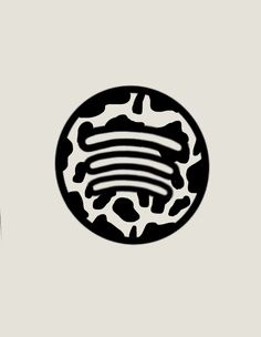 two black and white circles with designs on them