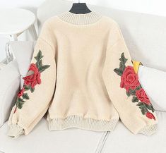 Floral Knit Sweater, Cozy Long Sleeve Sweater With Floral Embroidery, Beige Floral Embroidered Winter Outerwear, Beige Winter Outerwear With Floral Embroidery, Beige Long Sleeve Sweater With Floral Embroidery, Beige Floral Embroidered Sweater For Fall, Trendy Embroidered Winter Tops, Casual Winter Sweater With Floral Embroidery, Cream Floral Embroidery Sweater For Fall