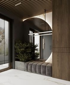 the interior of a modern house with wood and marble accents