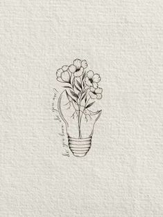 a drawing of flowers in a light bulb