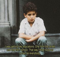 a young boy sitting on the steps with his arms crossed and looking at the camera text reads, i was getting two educations one from the street and one from