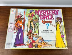 the mystery date game is on display in front of a white box with an image of three women