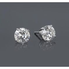 METAL SPECIFICATIONS White Gold 14K STONE SPECIFICATIONS Stone Name : Diamond Stone Cut : Round Stone Details : There is one round cut diamond approx. 0.75 carats (Approx. Diameter 5.6 mm) in each earring. Natural earth mined diamonds. Total : Approx. 1.50 Carats Color : F Clarity : VS1 EARRING SPECIFICATIONS Appraised Value : $3579. 00 Comes with Certificate Diamond Earrings Studs Round, Halo Earrings Studs, Diamond Stud Earrings, Natural Earth, Diamond Stud, Simple Earrings, Princess Cut Diamonds, Conflict Free Diamonds, Real Diamonds