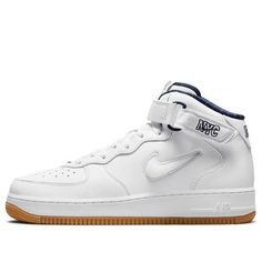 The Nike Air Force 1 Mid Jewel QS ‘NYC - Yankees’ is a tribute to the team that plays in the Bronx and upper Manhattan. This white leather sneaker has navy Swoosh branding with a jeweled edge, and also features green circular pods on the outsole for traction. You can adjust the ankle strap for a perfect fit, and there’s even a woven tongue tag with NYC graphics. (AF1/SNKR/Skate/Unisex/Mid Top/Non-Slip/Wear-resistant) High-top Nike Air Force 1 With Embossed Logo, Nike White Sneakers With Embossed Logo, Nike Air Force 1 High-top With Embossed Logo, Nike Air Force 1 With Embossed Logo For Sports, White Mid-top Nike Air Force 1, Nike Mid-top Sneakers For Sports Events, Basketball Shoes With Embossed Logo And Round Toe, Sports Basketball Shoes With Embossed Logo, White Skate Shoes With Embossed Logo For Sports