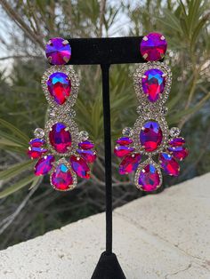 Purple Party Earrings With Sparkling Stones, Purple Sparkling Stones Earrings For Party, Purple Rhinestone Crystal Earrings For Party, Party Purple Crystal Rhinestone Earrings, Purple Rhinestone Earrings For Party, Purple Rhinestone Party Earrings, Purple Crystal Earrings For Party, Purple Sparkling Crystal Earrings For Parties, Pink Rhinestone Chandelier Earrings For Party