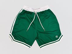 All New Boston Green Mesh Basketball Shorts Perfect for all hoopers Men and Women  Lightweight, breathable polyester material perfect for running and hooping Look great on and off the court with our Mesh Basketball shorts with ribbed lining and 5 inch inseam  *ALL ORDERS SHIP WITHIN 1 BUSINESS DAY! * Fitness Shorts, Clothing Pieces, Mesh Shorts, Basketball Shorts, Shorts With Pockets, Workout Shorts, Polyester Material, Short Outfits, Looks Great