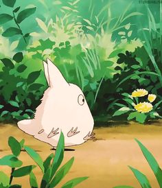 a white rabbit sitting on the ground in front of green plants and yellow dandelions