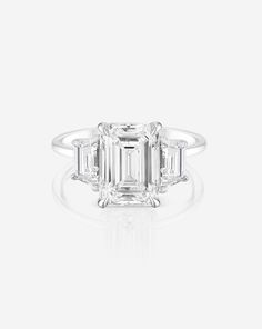 3.67 Emerald in the Whisper Thin® Three Stone with Trapezoids – Ring Concierge Trapezoid Side Stones, Nature Engagement Ring, Ring Concierge, Bespoke Engagement Ring, Natural Diamond Ring, Emerald Cut Diamonds, Cz Stone, Three Stone, Lab Diamonds