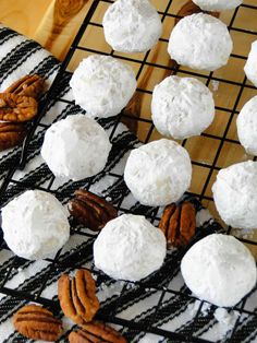 some pecans and cheese balls on a cooling rack